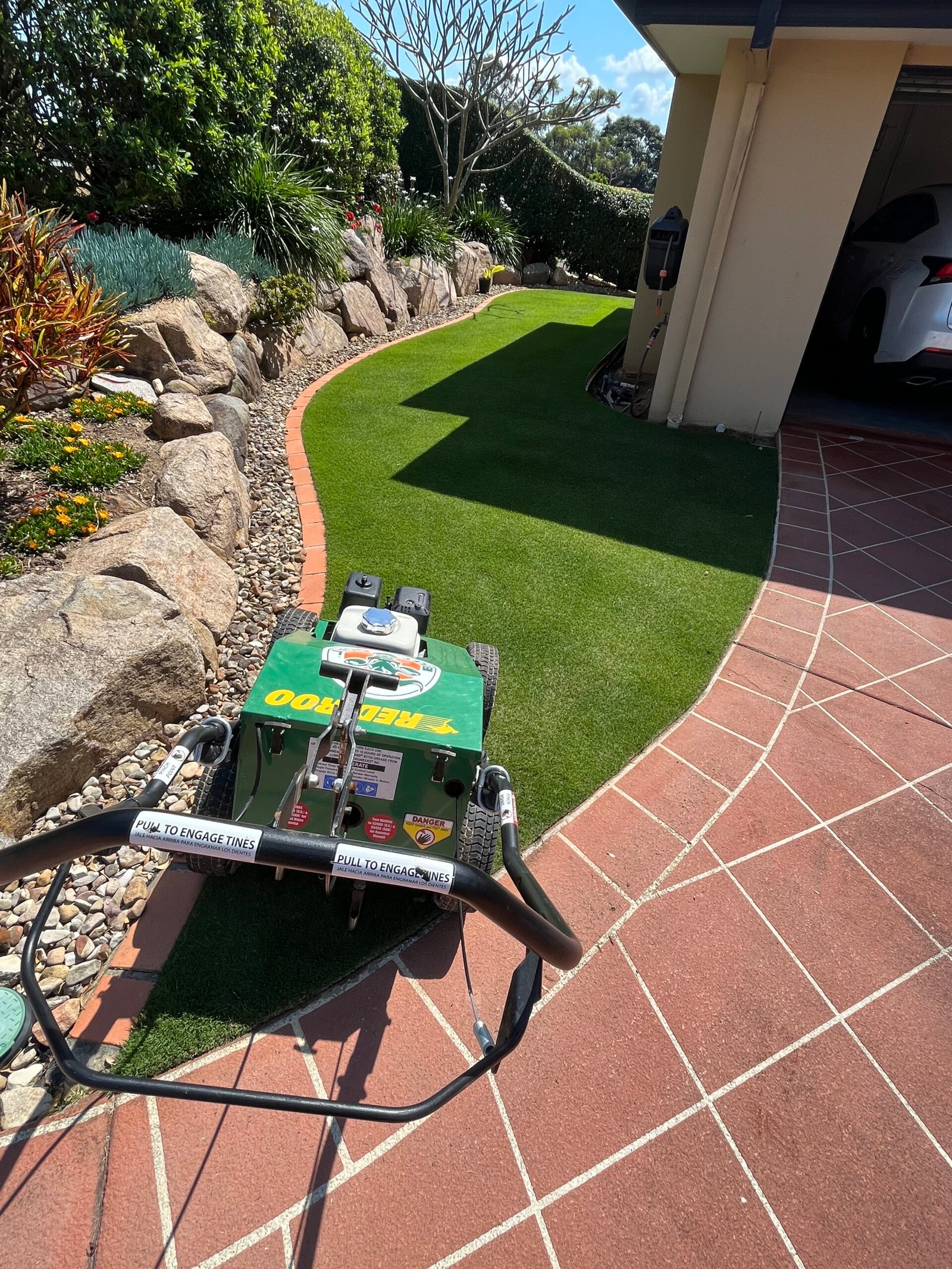Professional lawn renovation machine available for hire